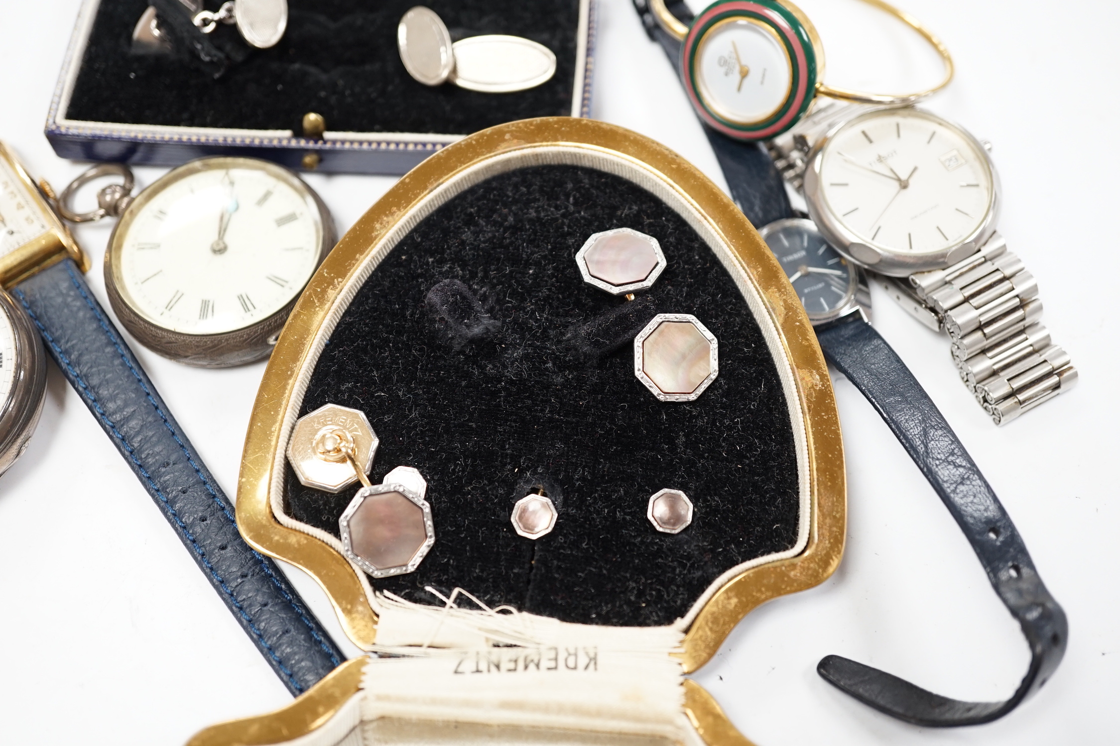 A late Victorian silver open face pocket watch, by J.W. Benson, a Swiss white metal fob watch, a lady's Gucci watch with interchangeable bezels, a pair of engine tuned silver cufflinks, and other sundry watches and jewel